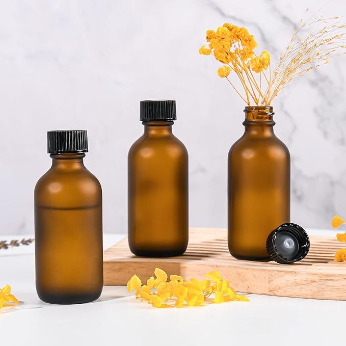 Exlvanto Small Glass Bottles with Lids Boston Round Shot Bottles for Health, Immunity, Ginger Juice, Essential Oils, Potion - Leak Proof Mini Travel Containers (Amber Frosted, 2oz-24Pack)