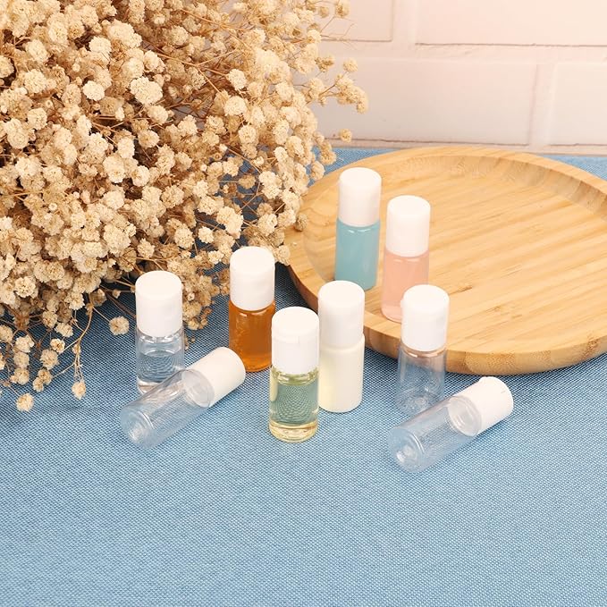 KUKLIPJIM 200 Pack 0.35 oz Plastic Bottles with Top Caps, Clear Empty 10 ml Flip Top Cosmetic Bottles for Lotion and Shampoo, Travel-Friendly, BPA-Free